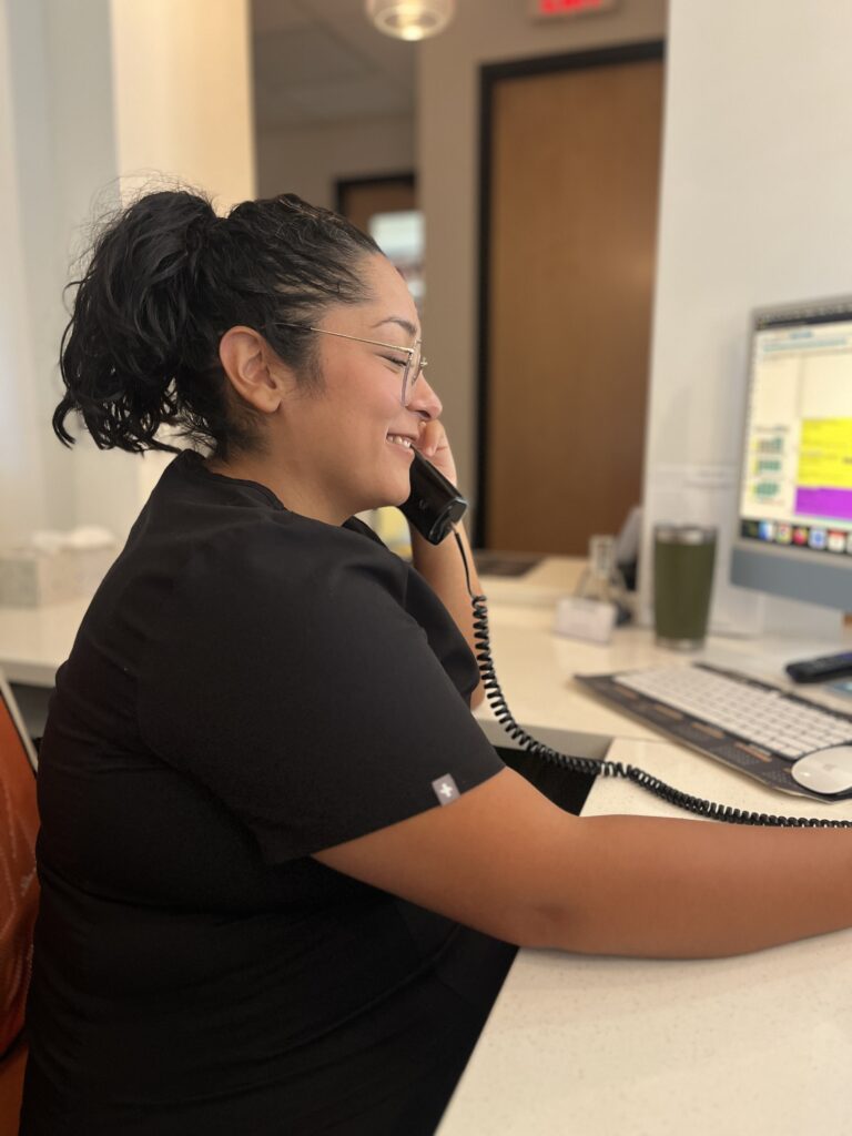 Melanie taking patient phone calls